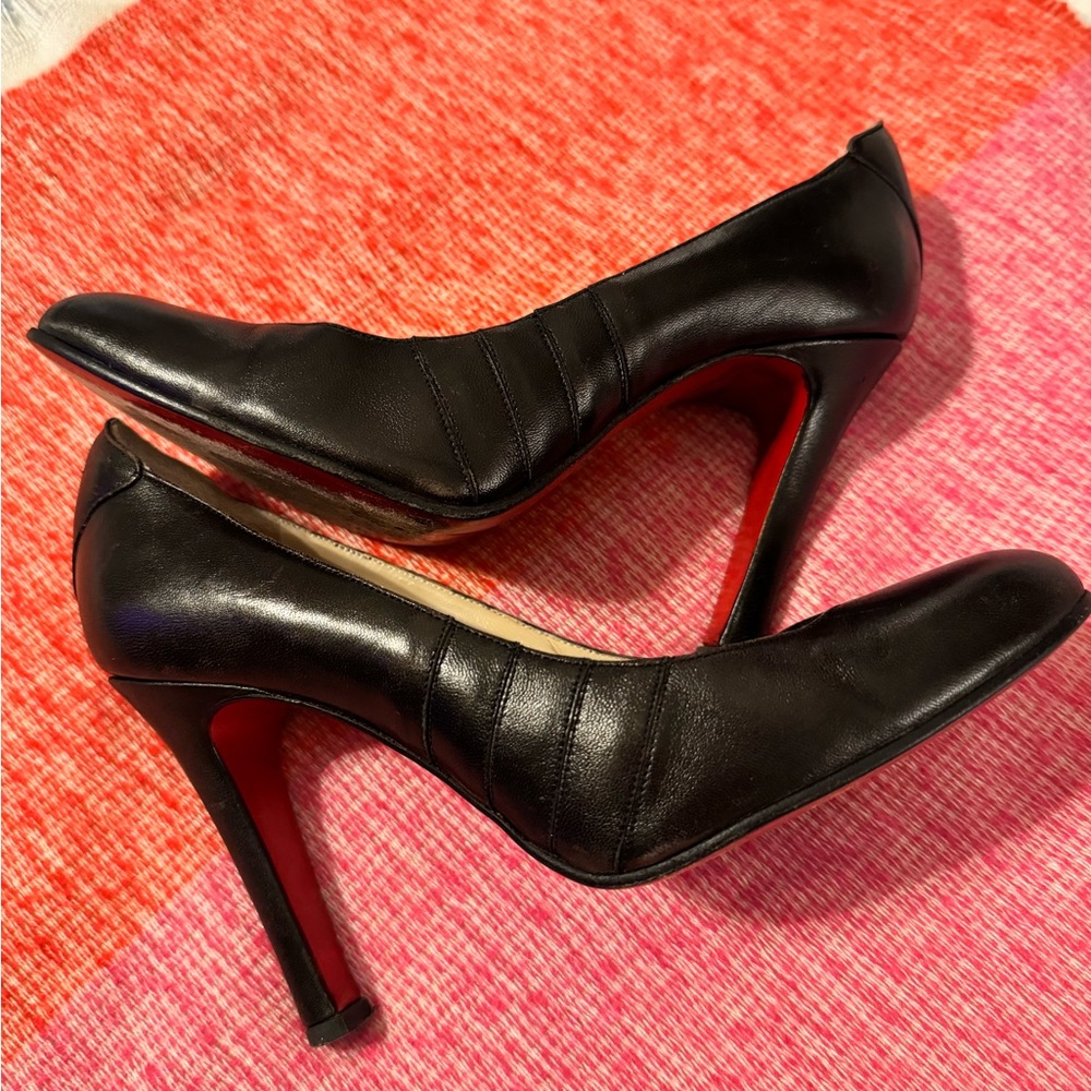 Christian Louboutin Used, in very good shape, black leather 4” heels.